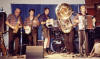 Bill, Gary, Karl, Eddie (behind drums), Tony (behind tuba), Steve.  Rock Springs Jam